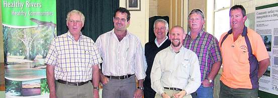 Team effort Team effort . . . Ross Crawford, Carl Walters, David Lee, part of the survey and design group, Sam Green from G-MW, farmer Dale Manuel and